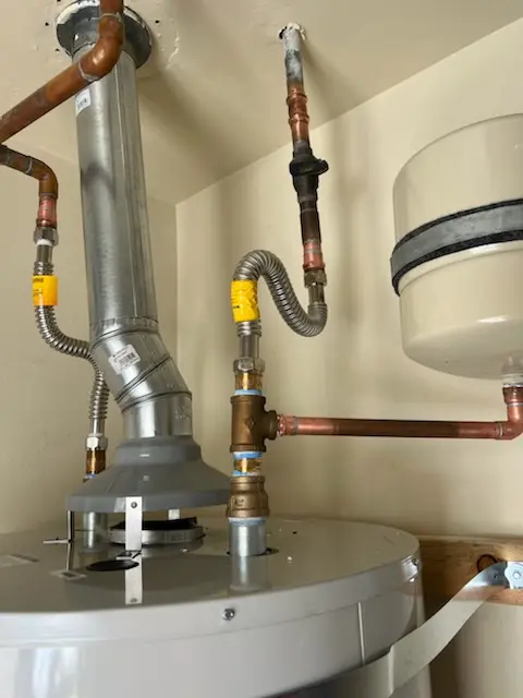 Water heater installation and plumbing repair in Melrose